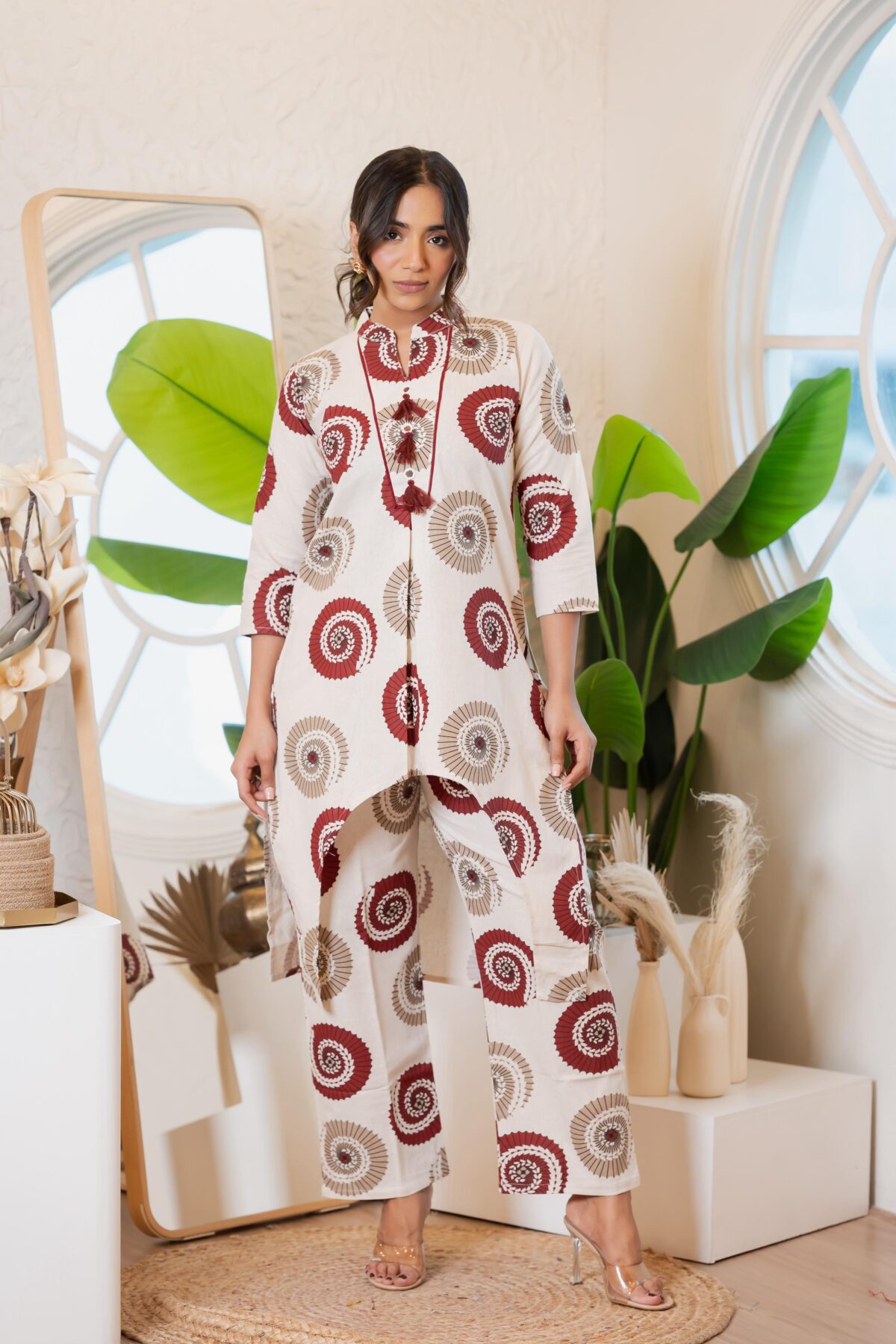 Blush cotton co-ord set, bold abstract floral prints, high-low kurta, straight Plazo pants